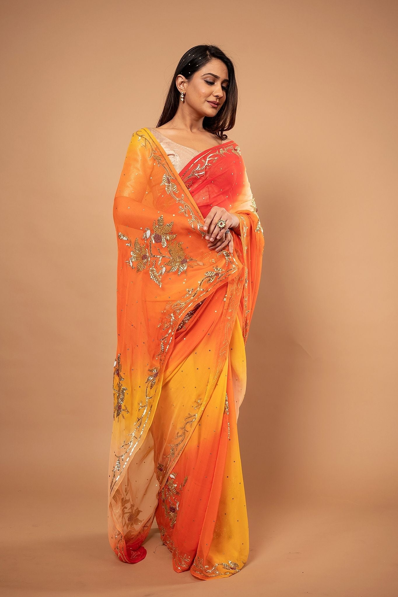 Yellow orange Pure Chiffon Aari sequins Motif handwork saree