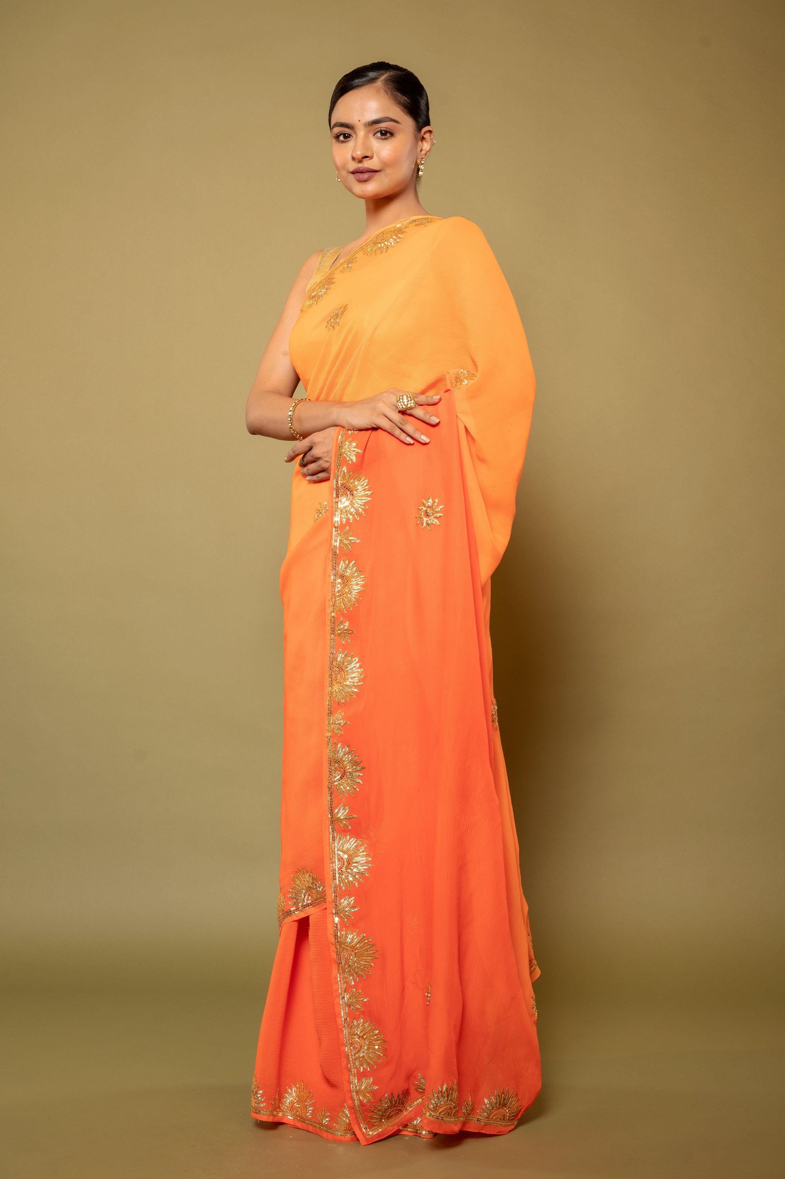 Orange light dark pure chiffon sikhiya gota border butti handwork saree