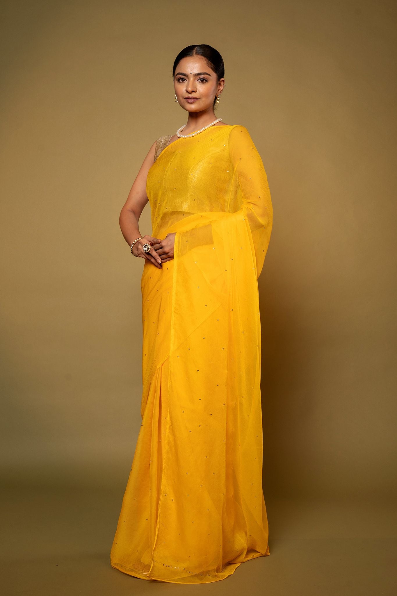 Yellow viscose chiffon Ringmukesh handwork casual wear saree