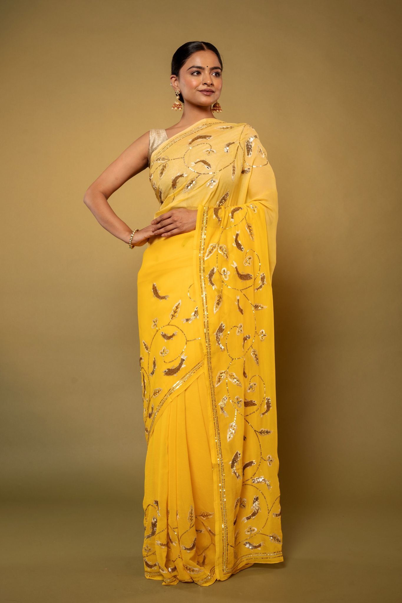 Yellow pure chiffon aari sequins jaal handwork saree