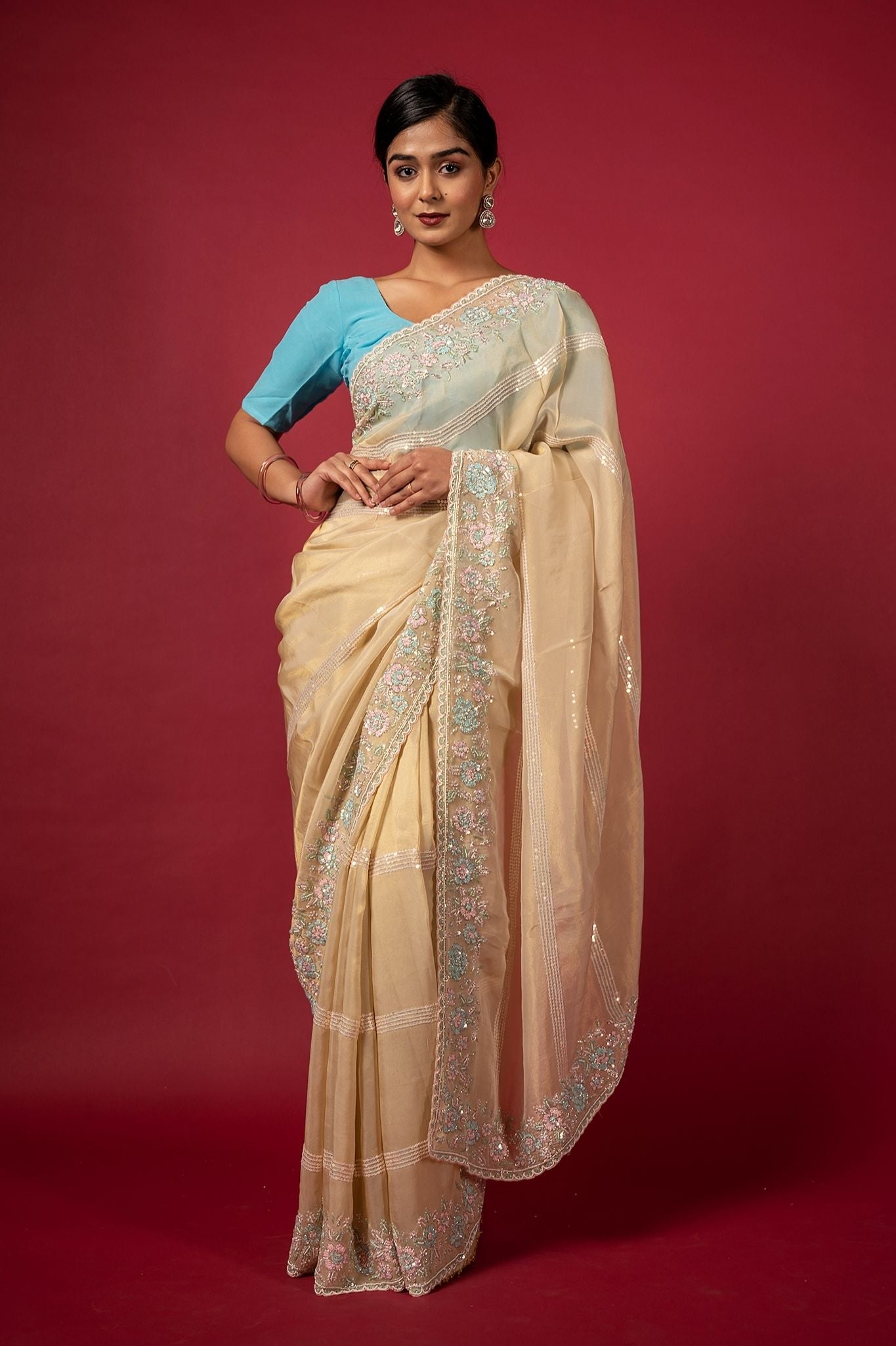 Cream organza preal sequins fancy work handwork saree