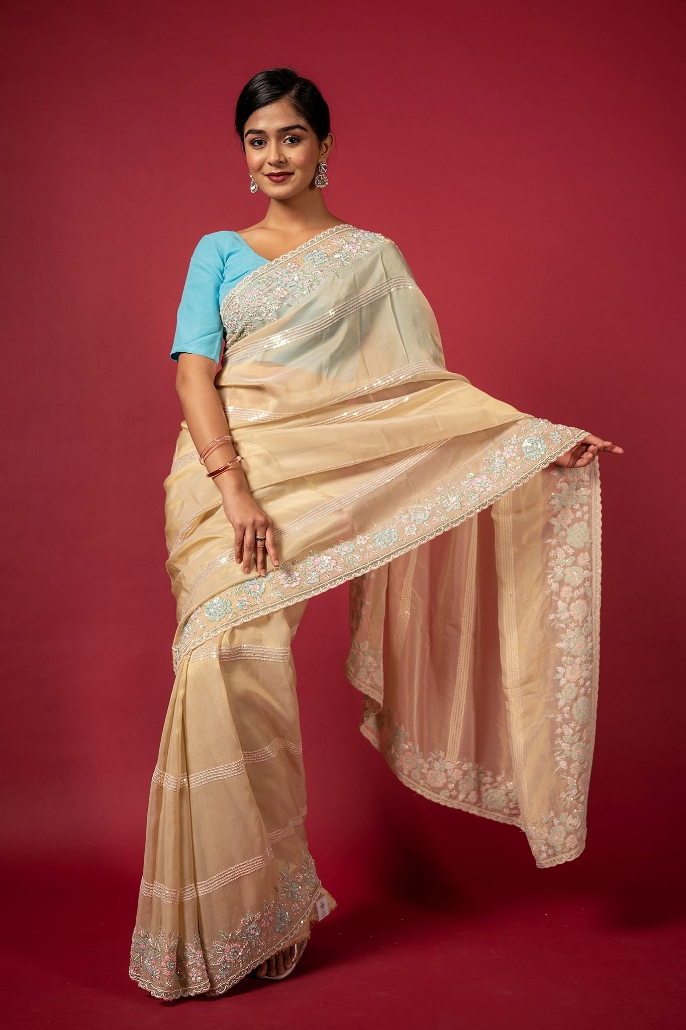 Cream organza preal sequins fancy work handwork saree
