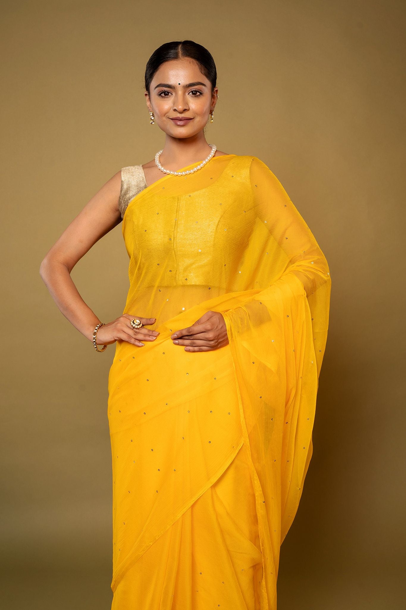 Yellow viscose chiffon Ringmukesh handwork casual wear saree
