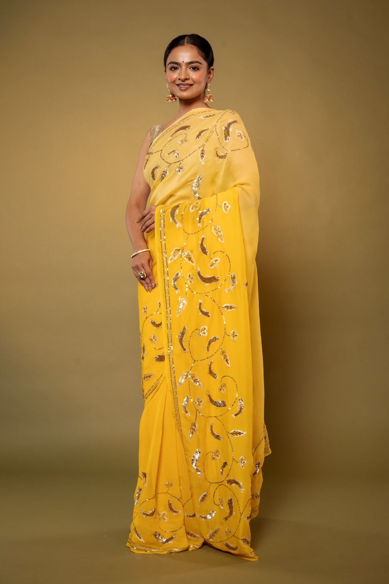 Yellow pure chiffon aari sequins jaal handwork saree