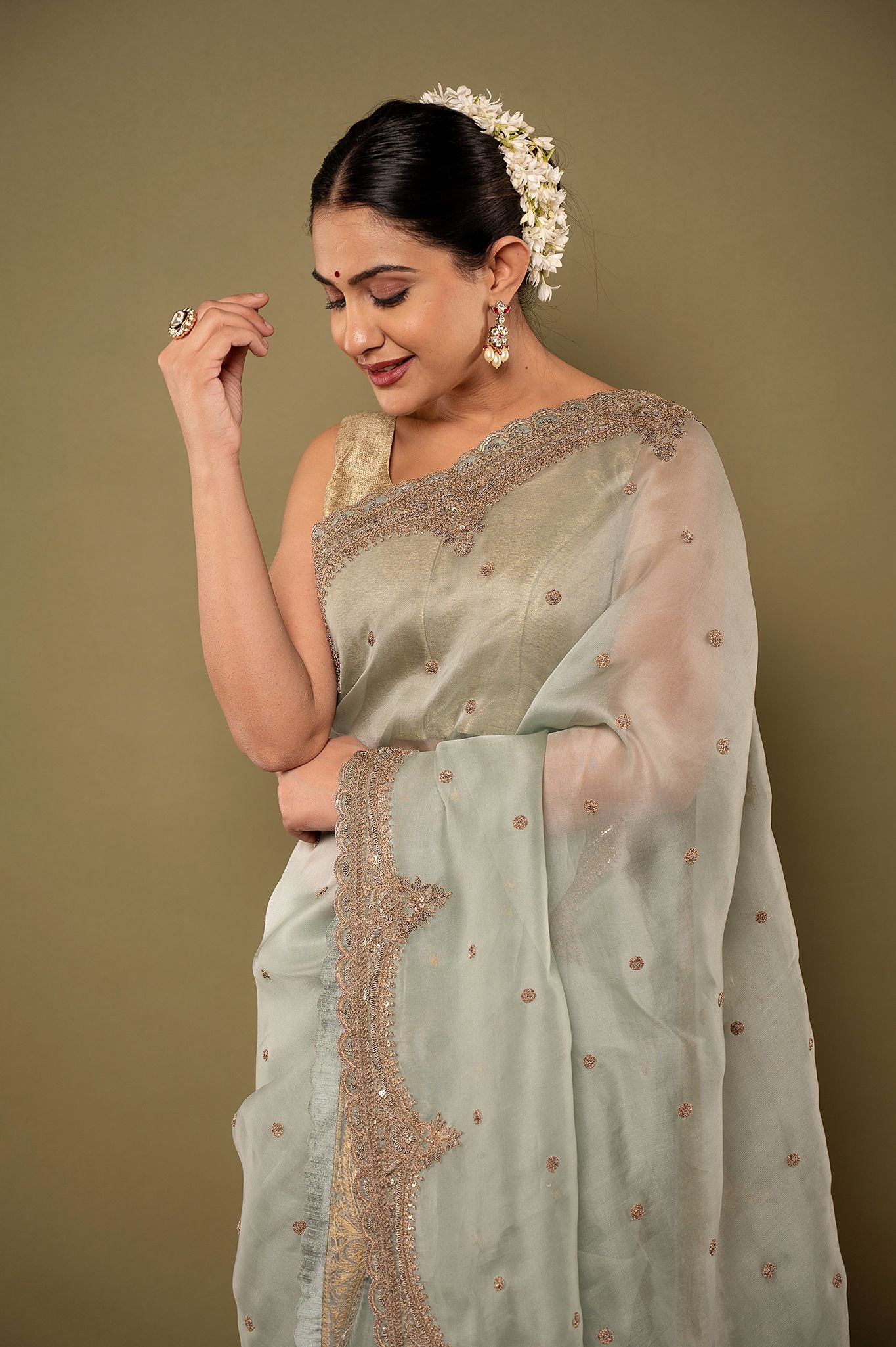 Greyish Green pure organza Dapka Marodi Border Butti handwork saree