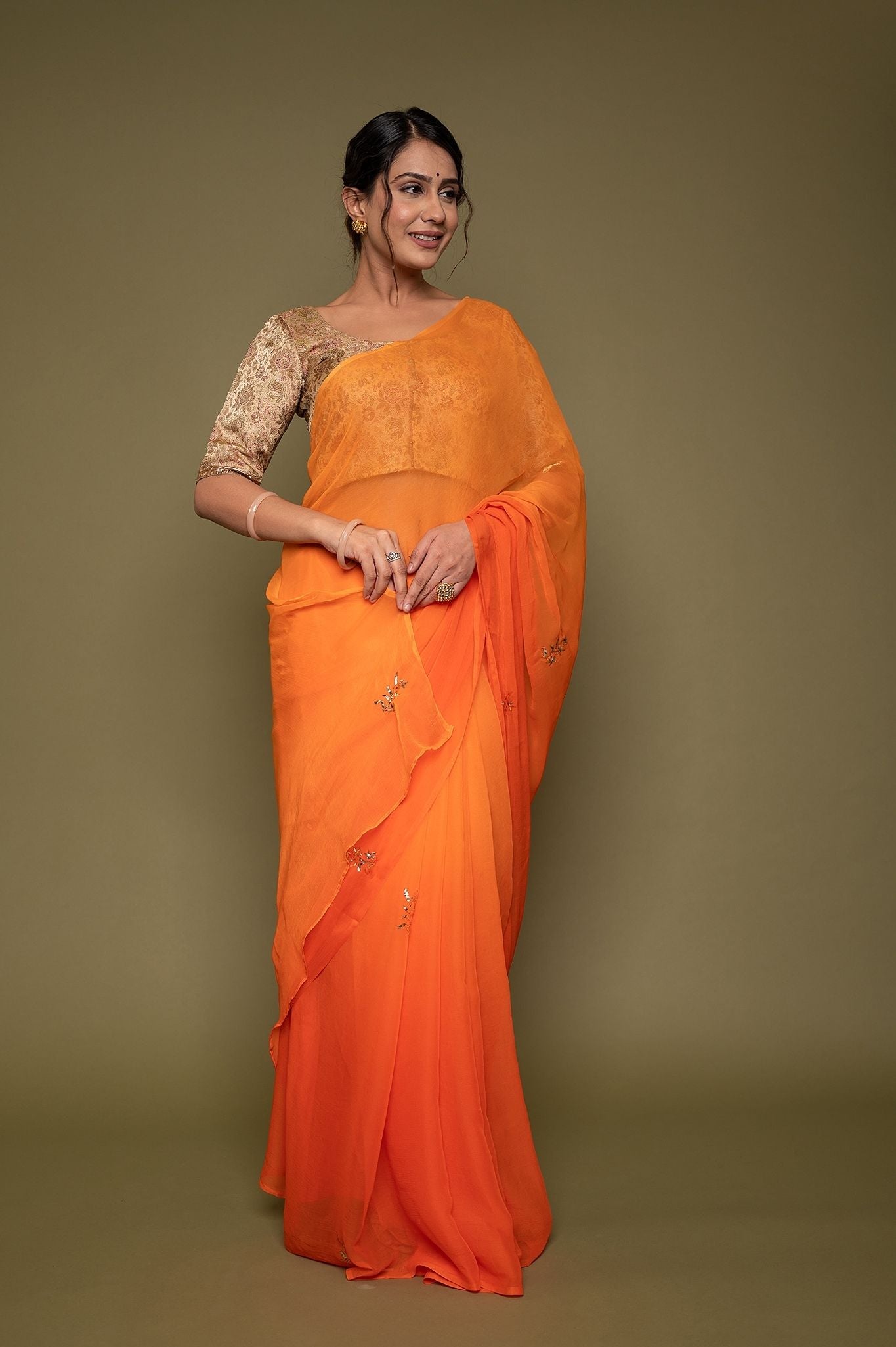 Orange viscose chiffon mughal mukesh handwork saree