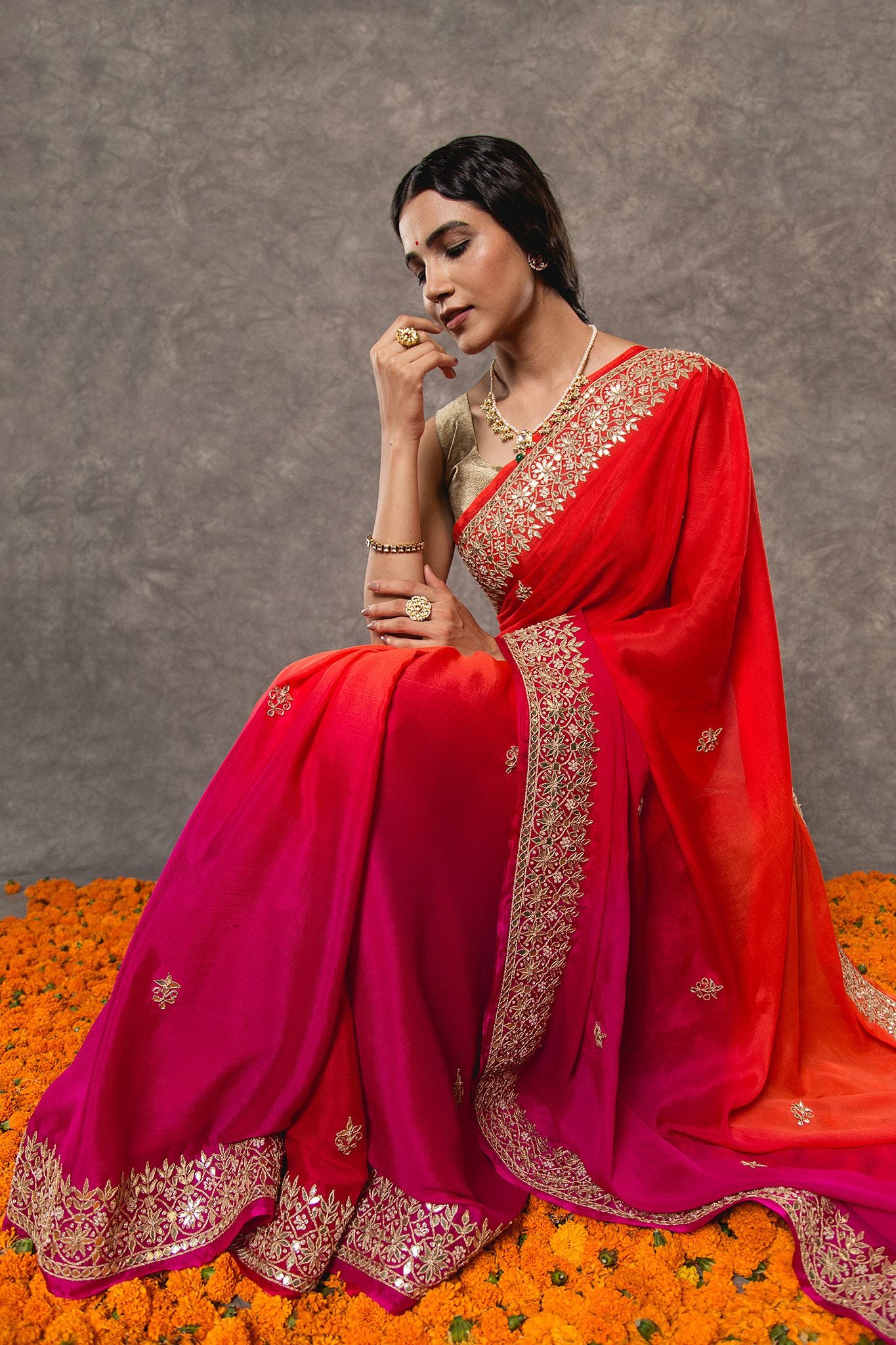 Rani orange pure chinnon chiffon gota pati border butti handwork saree