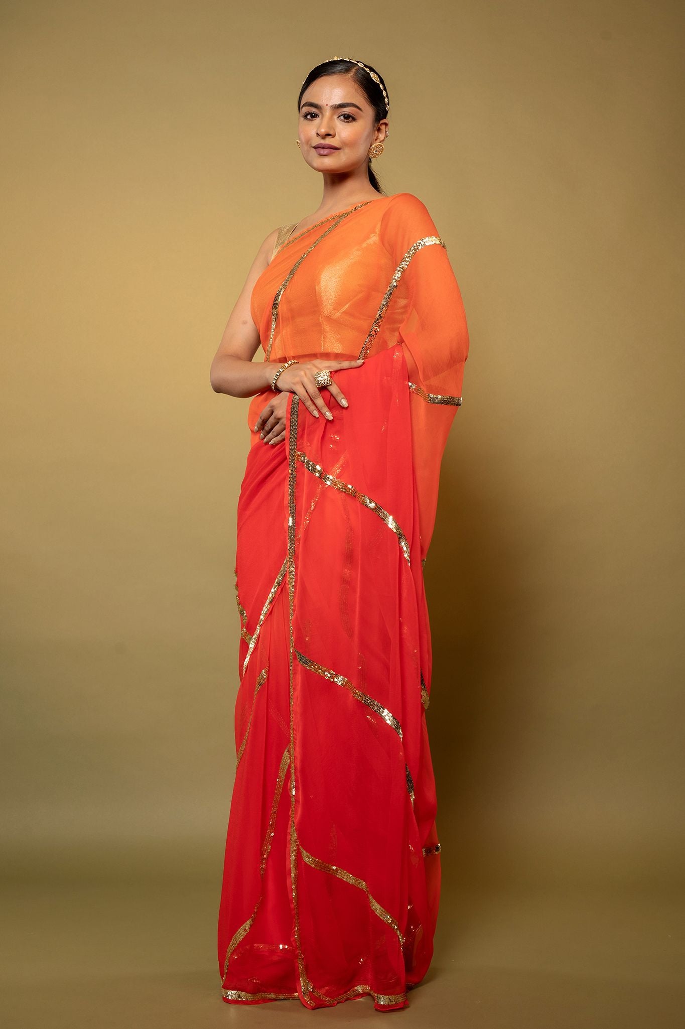 Orange light dark Viscose Chiffon sequins handwork party wear saree