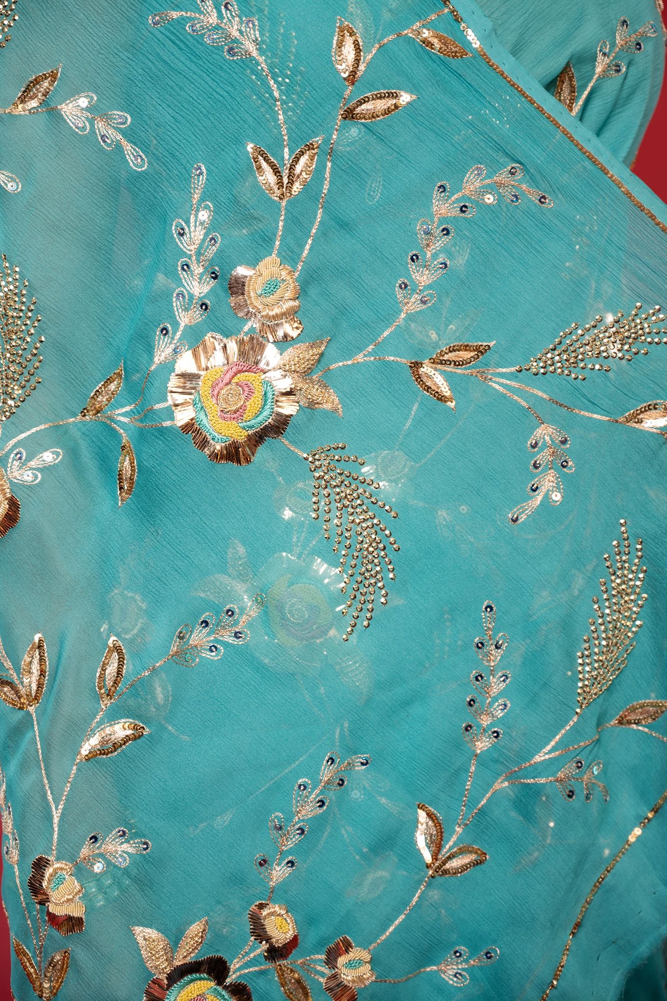 Turquoise pure chiffon aari sequins jaal handwork saree