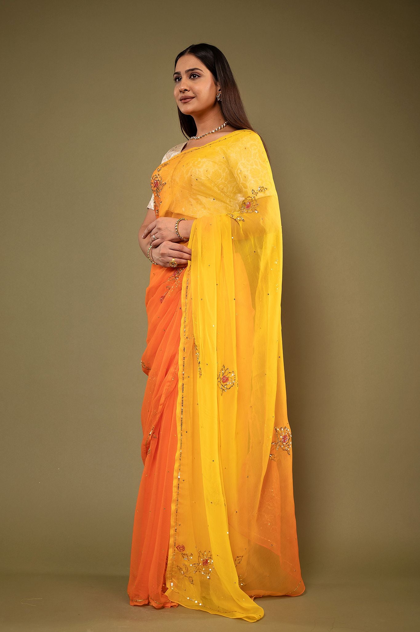 Orange yellow light dark viscose chiffon sequins motif handwork casual wear saree