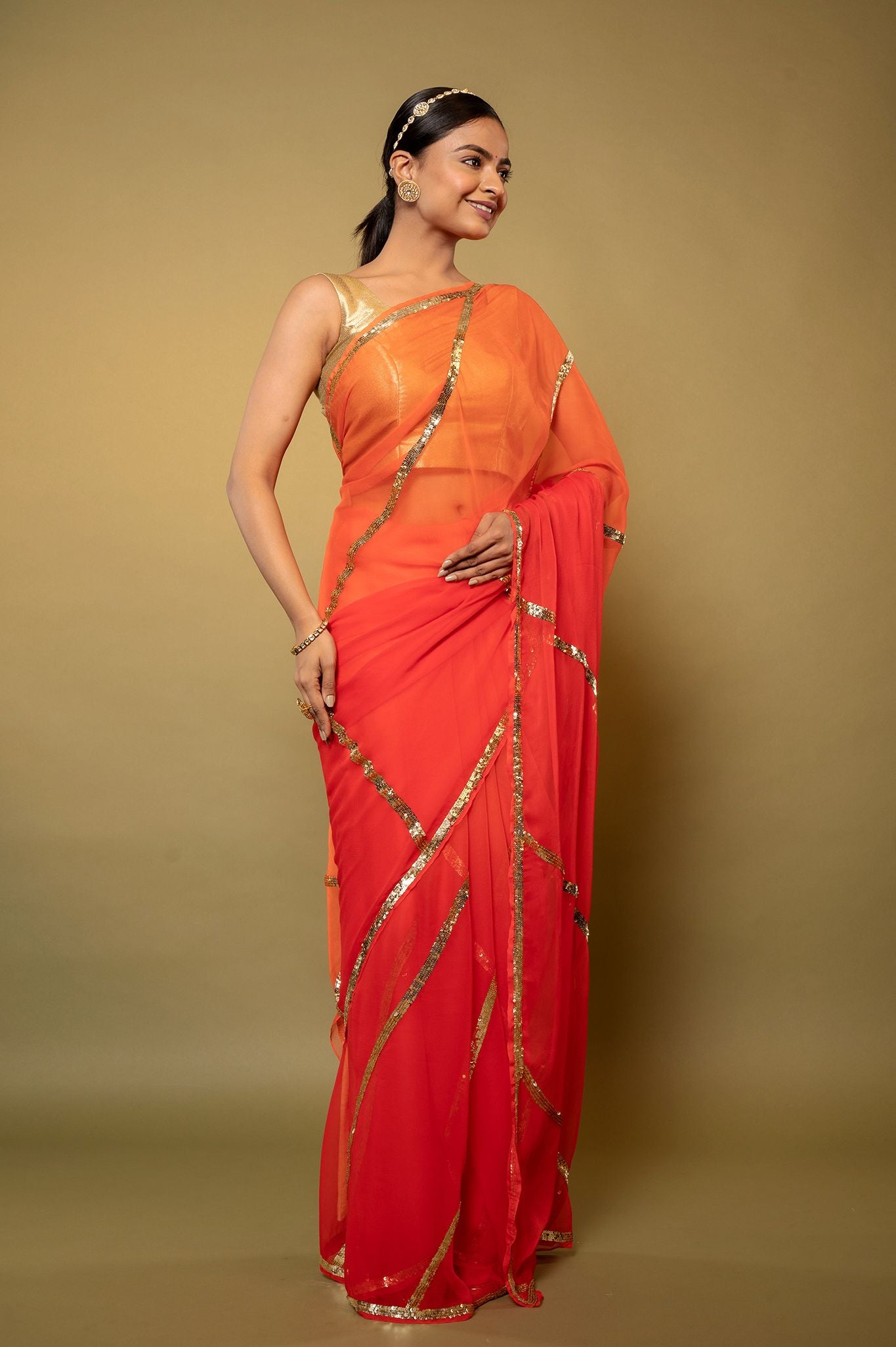 Orange light dark Viscose Chiffon sequins handwork party wear saree