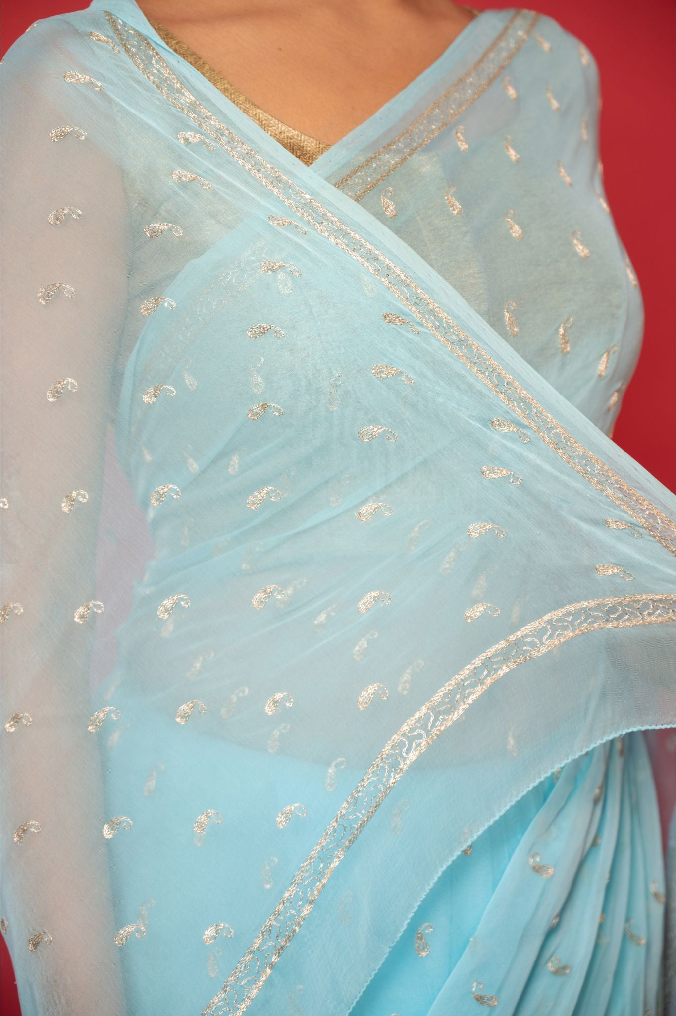 Sky blue viscose chiffon Aari motif handwork casual wear saree