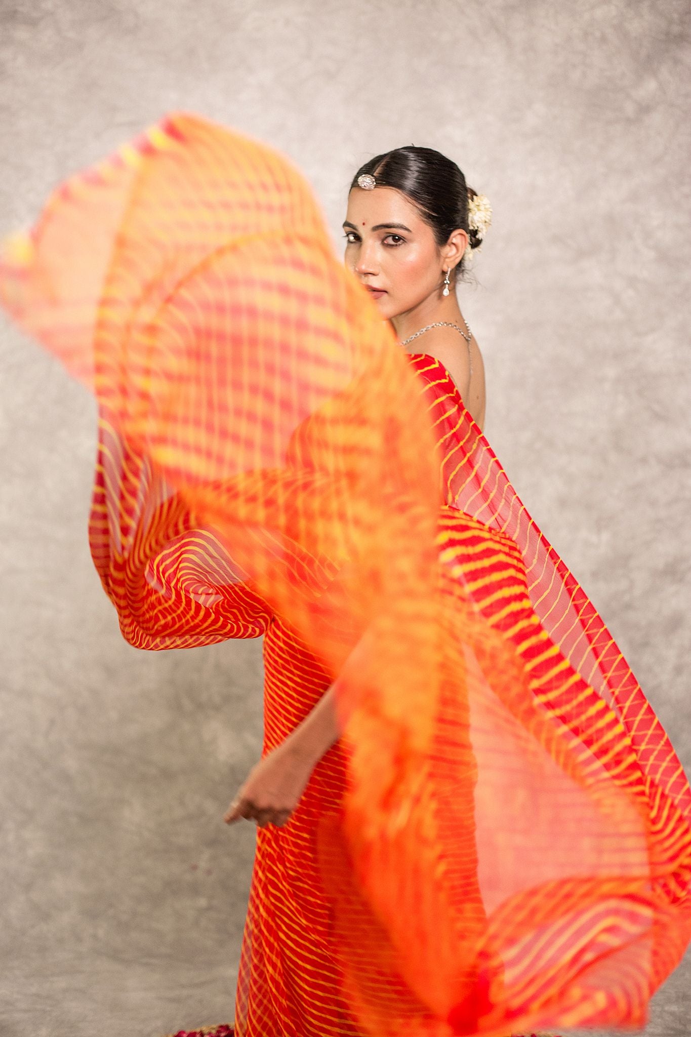 Orange lehariya Pure Georgette 20 Gsm plain hand dyed traditional wear saree