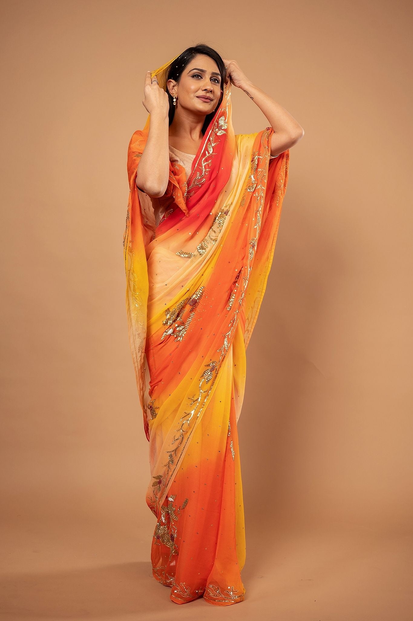 Yellow orange Pure Chiffon Aari sequins Motif handwork saree