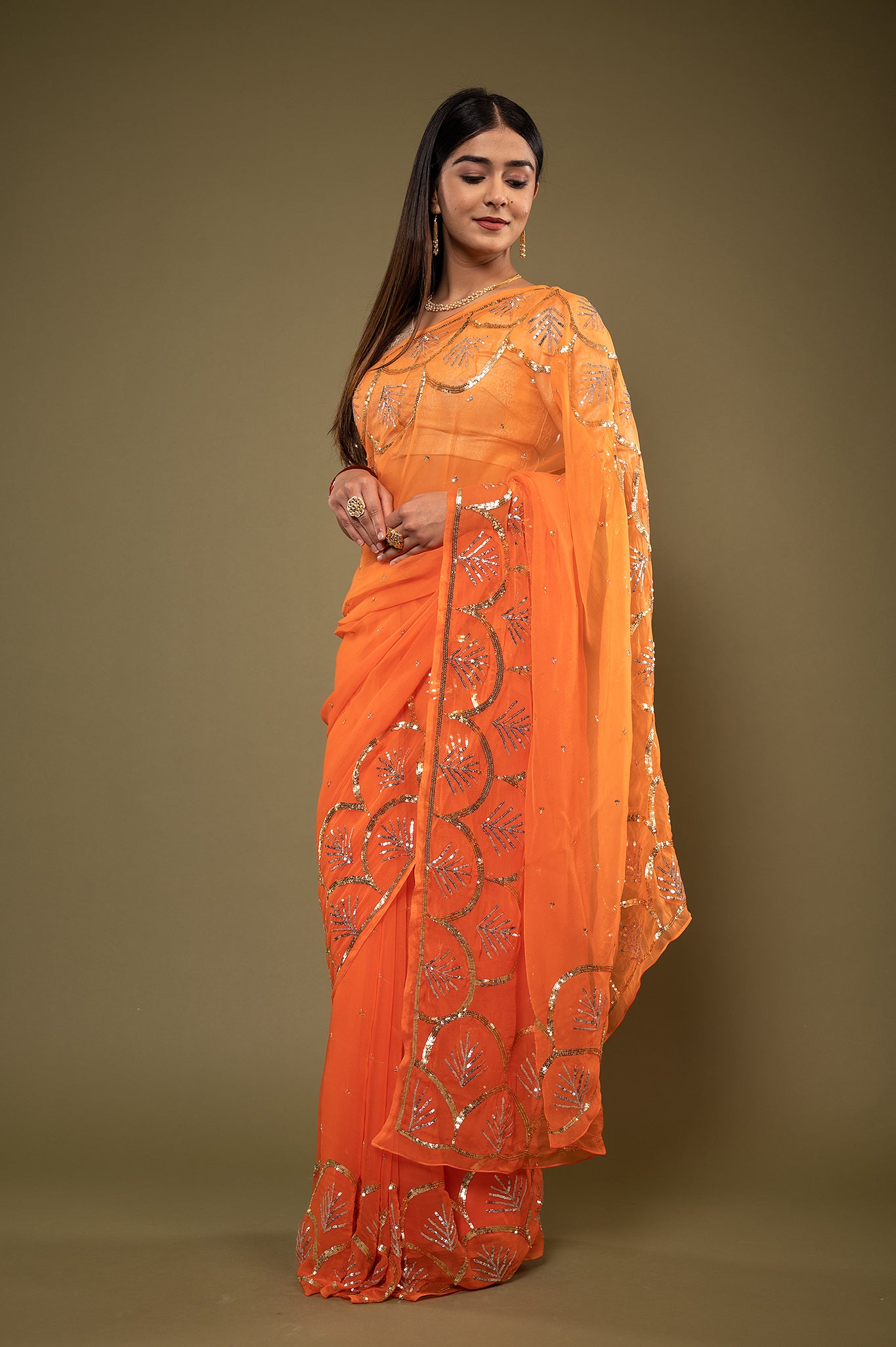 Orange viscose chiffon sequins border butti handwork casual wear saree
