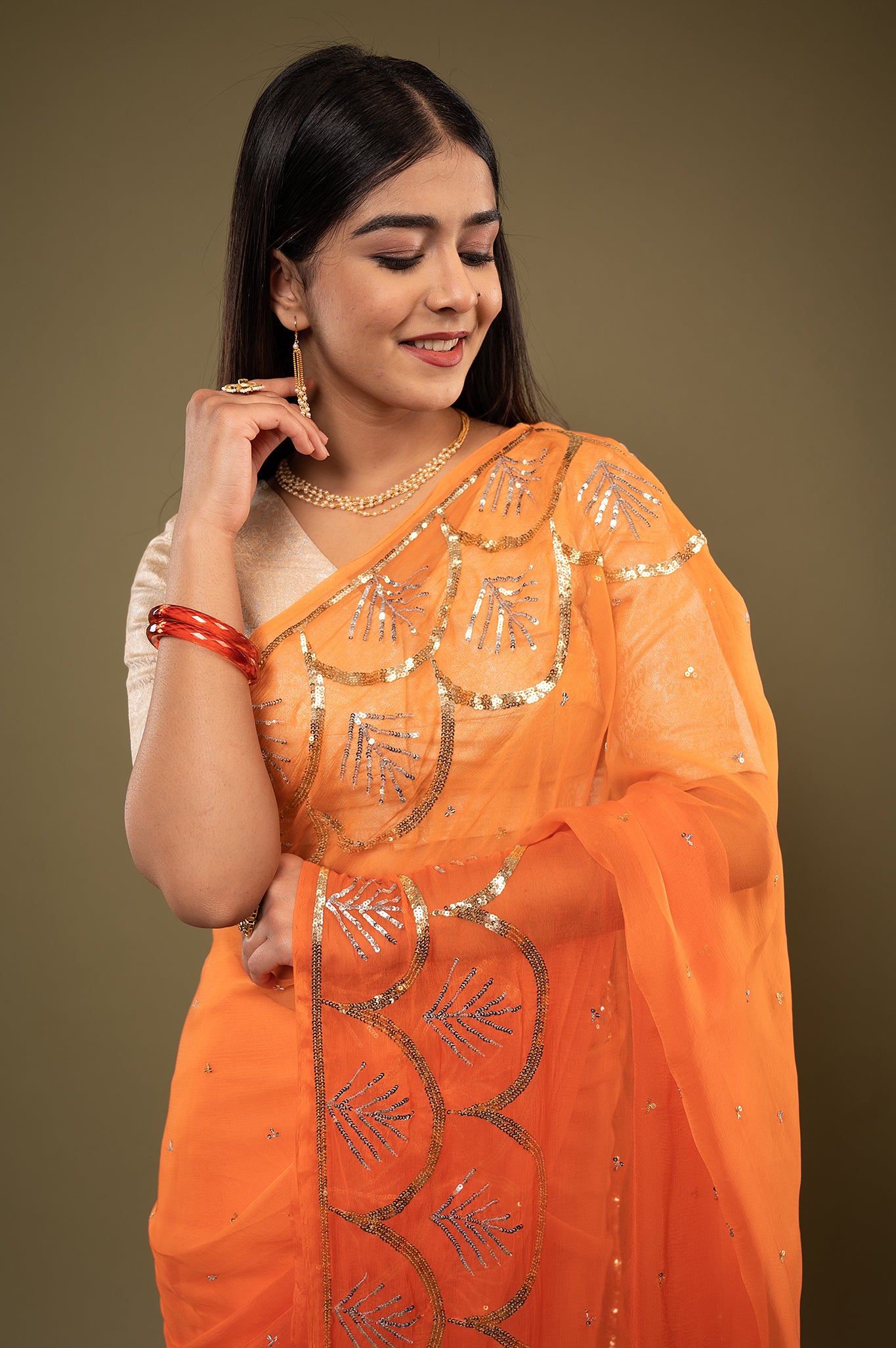 Orange viscose chiffon sequins border butti handwork casual wear saree