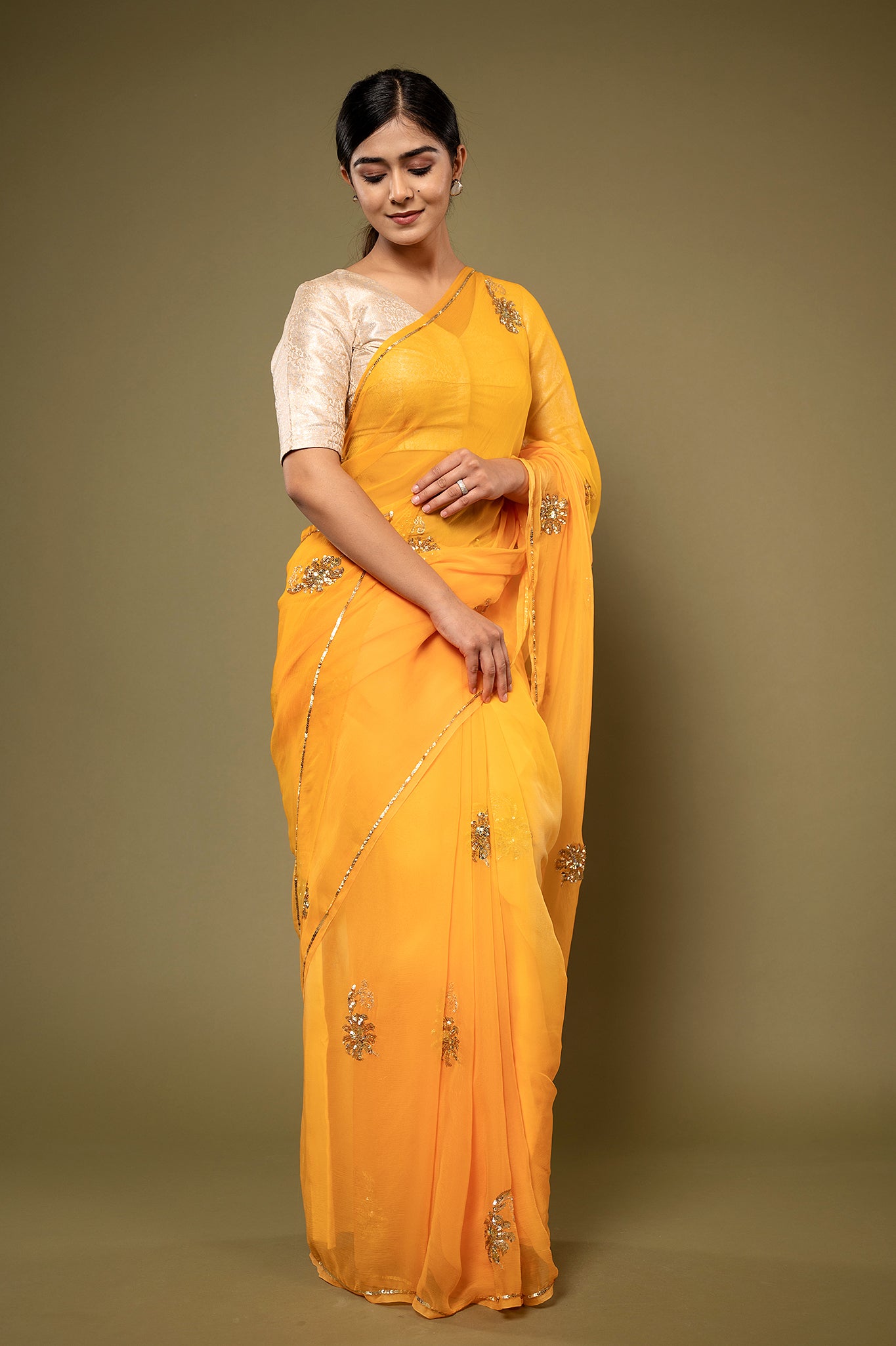 Mustard viscose chiffon sequins motif handwork casual wear saree