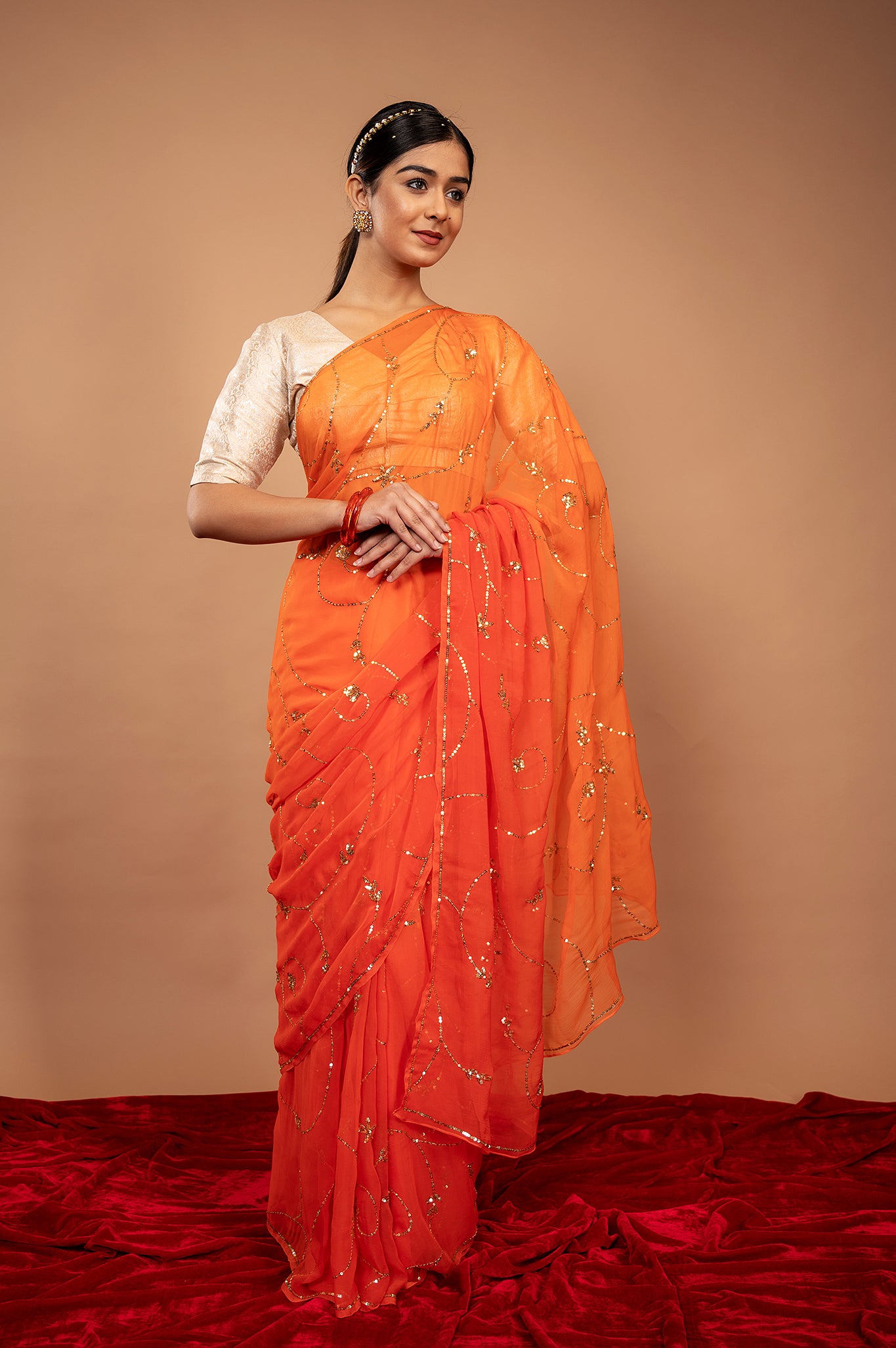Orange viscose chiffon Sequins jaal handwork casual wear saree