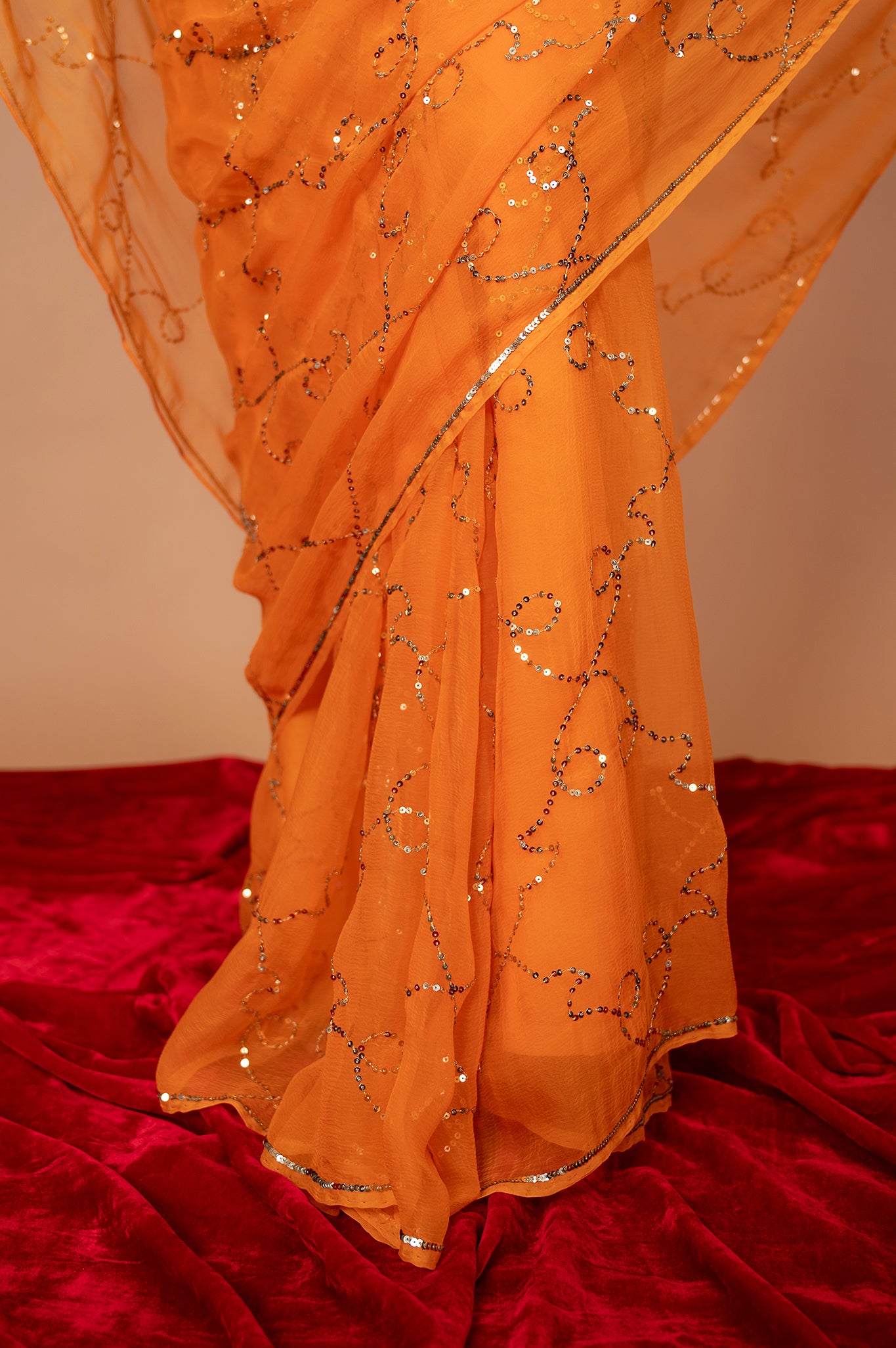 Orange light dark viscose chiffon Aari Sequins jaal handwork casual wear saree
