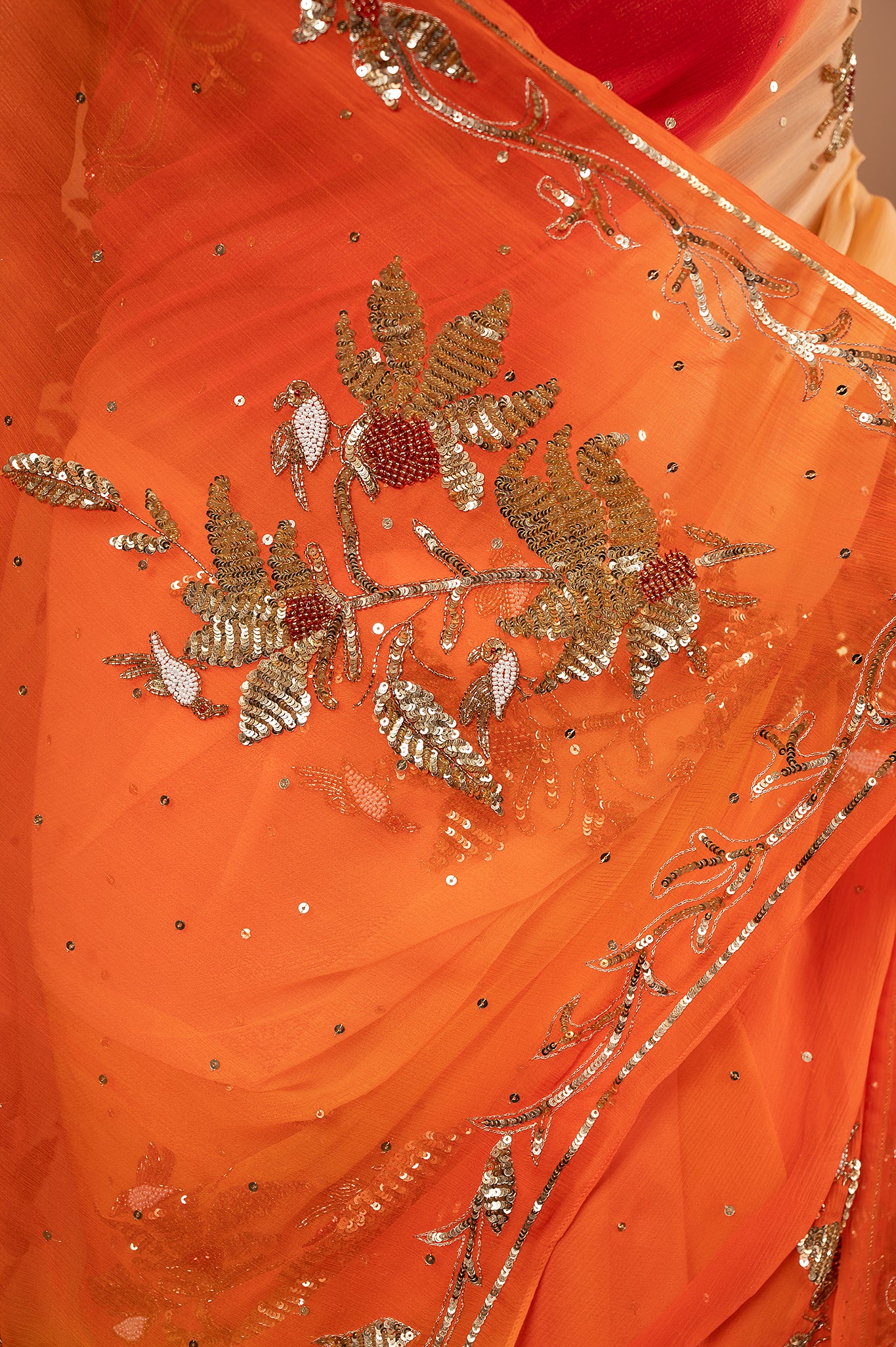 Yellow orange Pure Chiffon Aari sequins Motif handwork saree