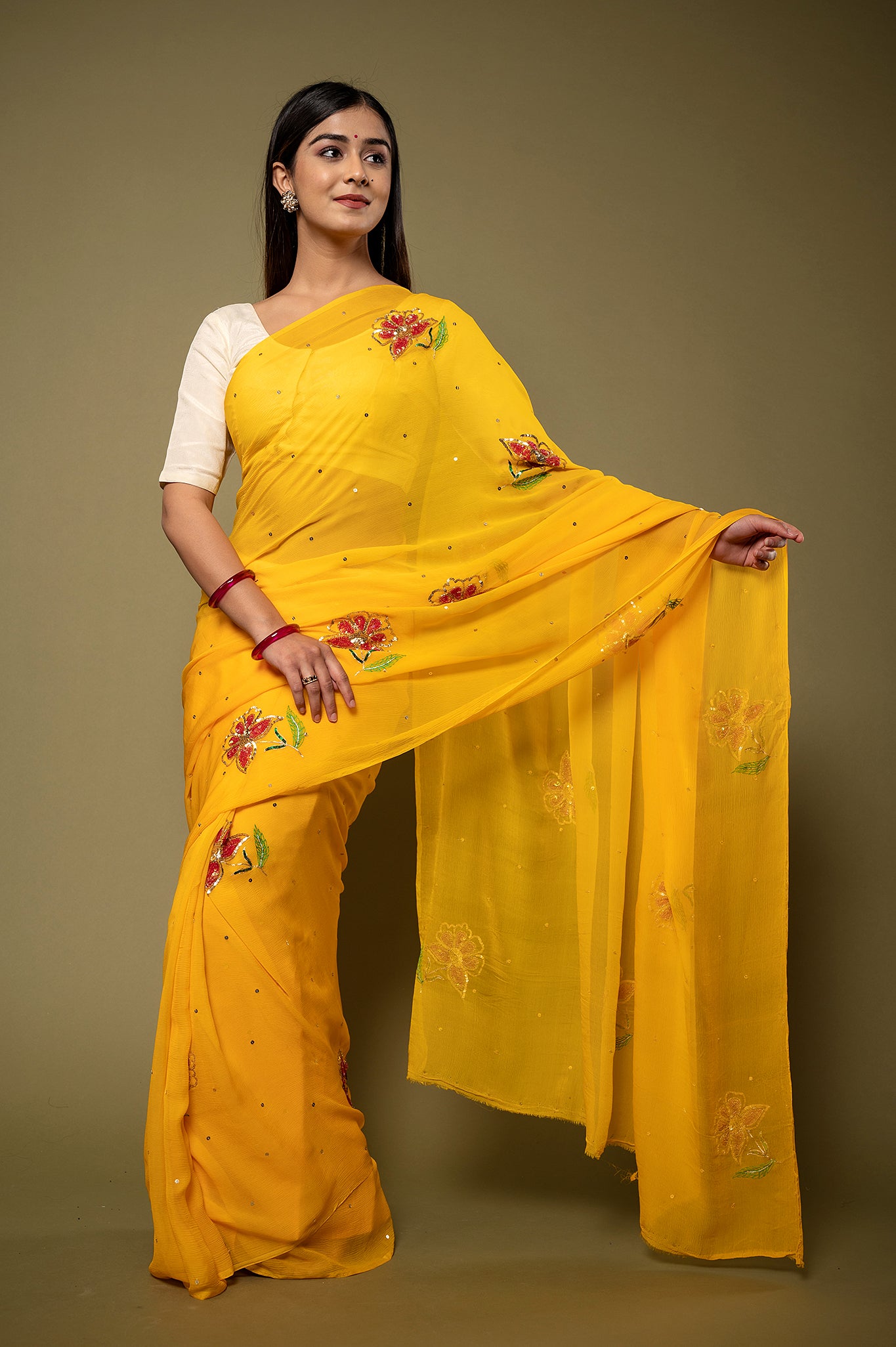 Yellow Pure chiffon sequins resham motif handwork party wear saree