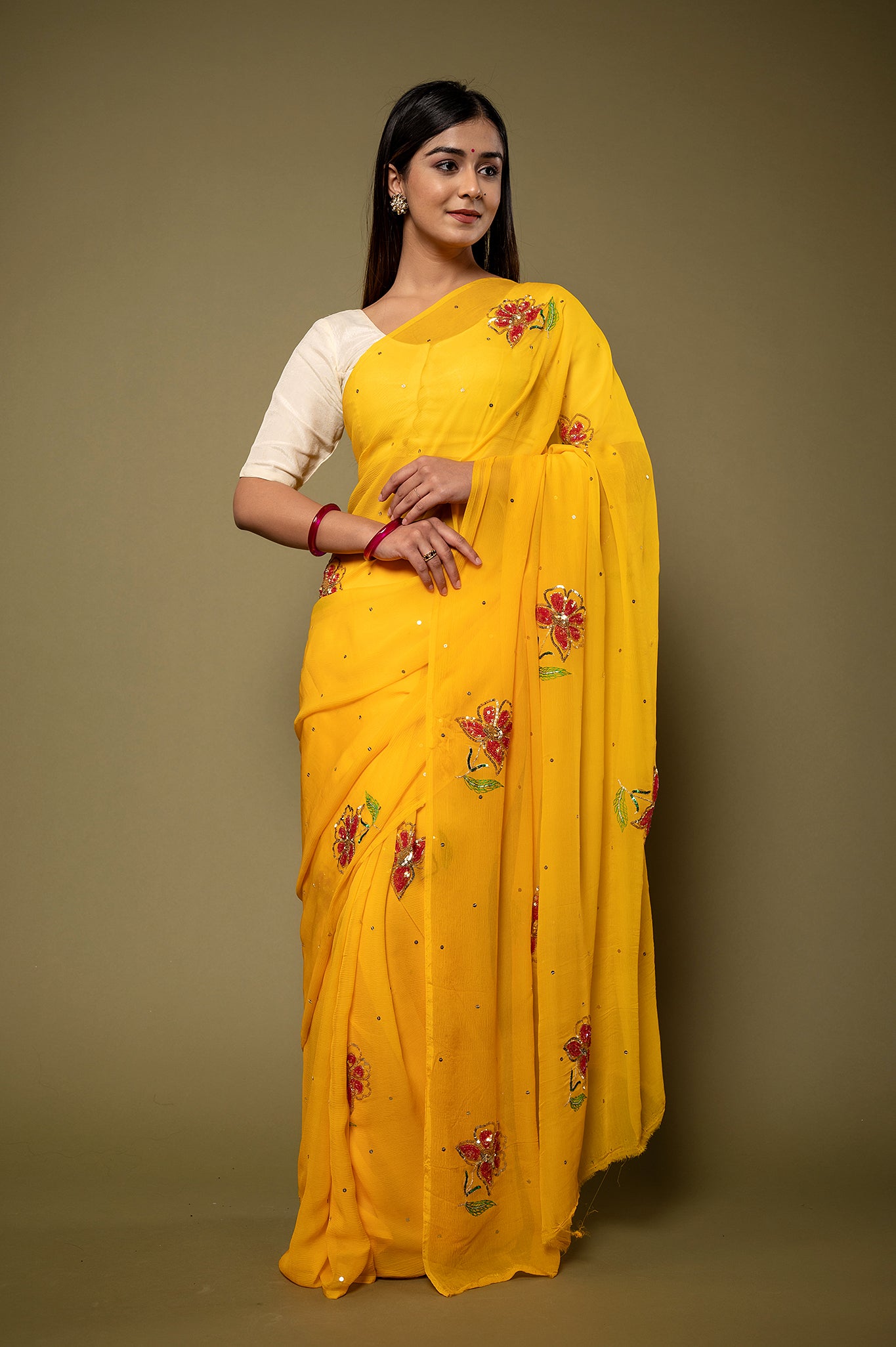 Yellow Pure chiffon sequins resham motif handwork party wear saree