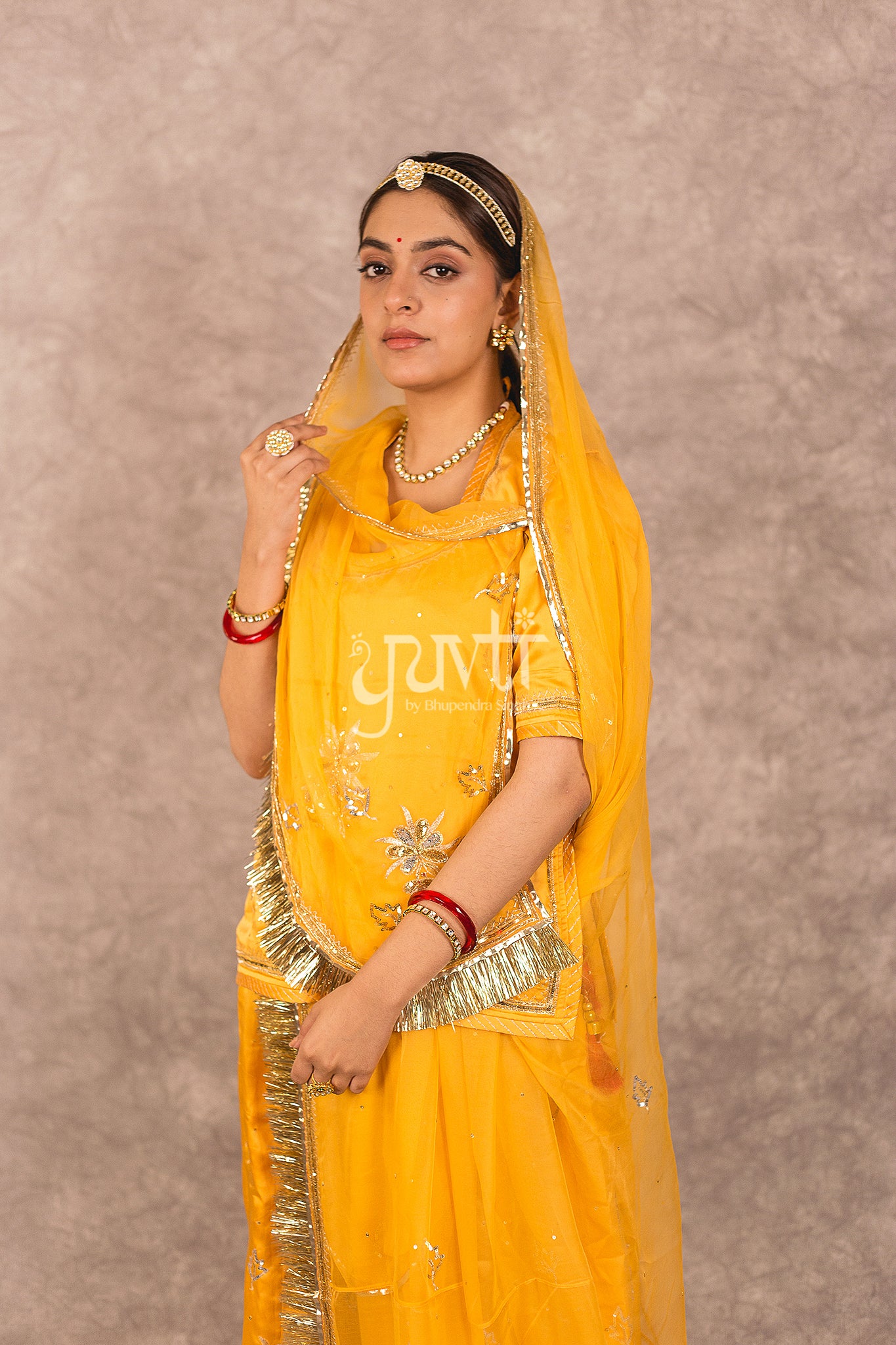Yellow Bamber Satin Aari Sequins Boota work Rajputi Poshak