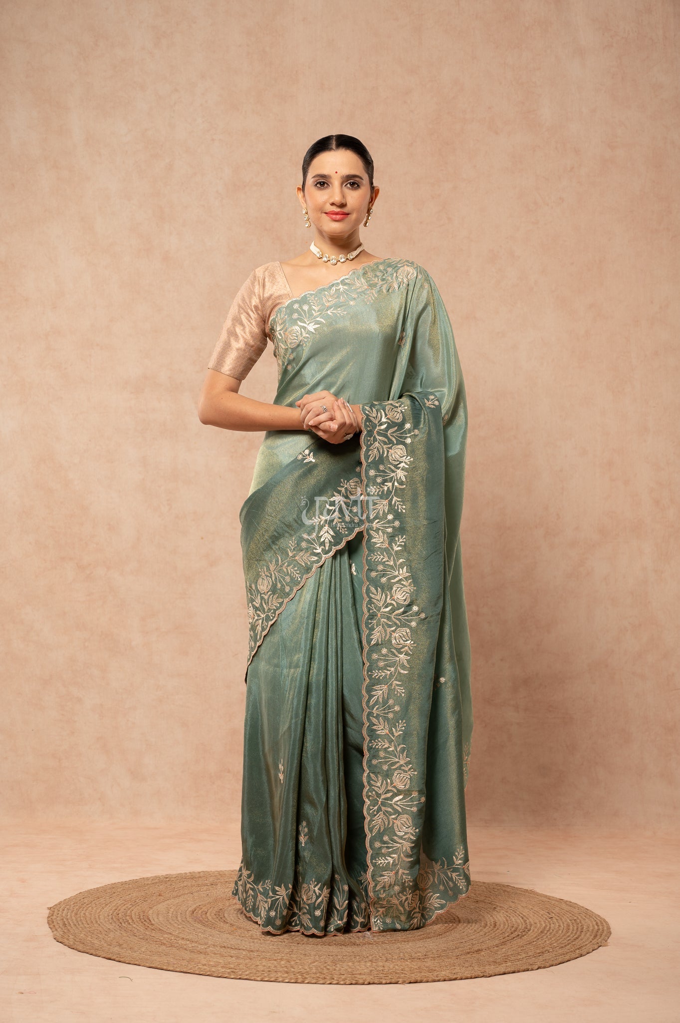 Mate Green Shaded Viscose Tissue Aari Border Motifs (Butti) Saree