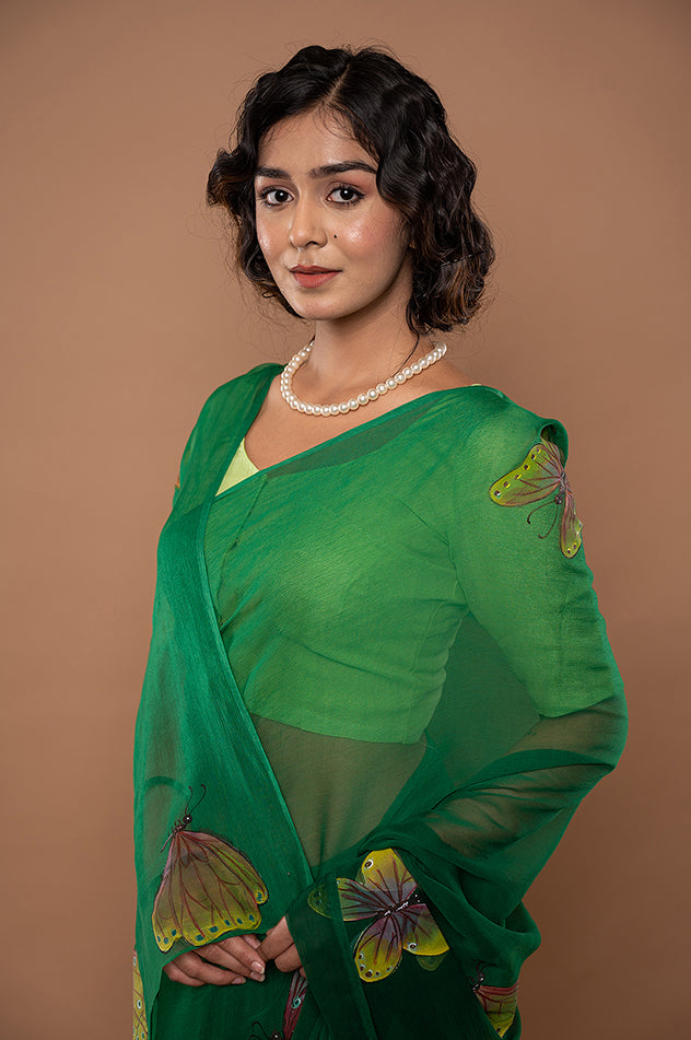 bottle green viscose chiffon hand painted handwork saree