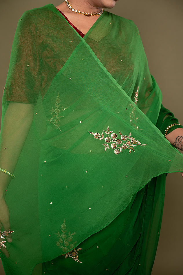 green light dark viscose chiffon aari sequins motif handwork saree