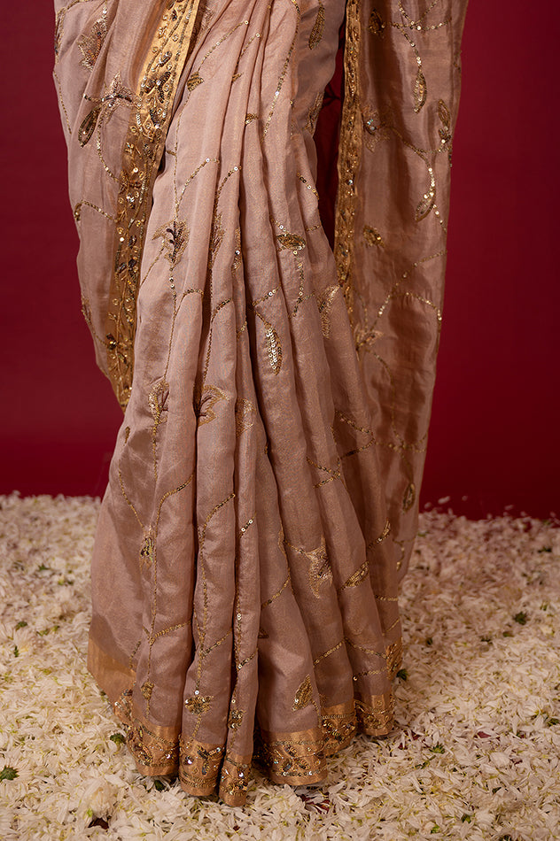 Soft peach pure tissue aari sequins jaal handwork saree