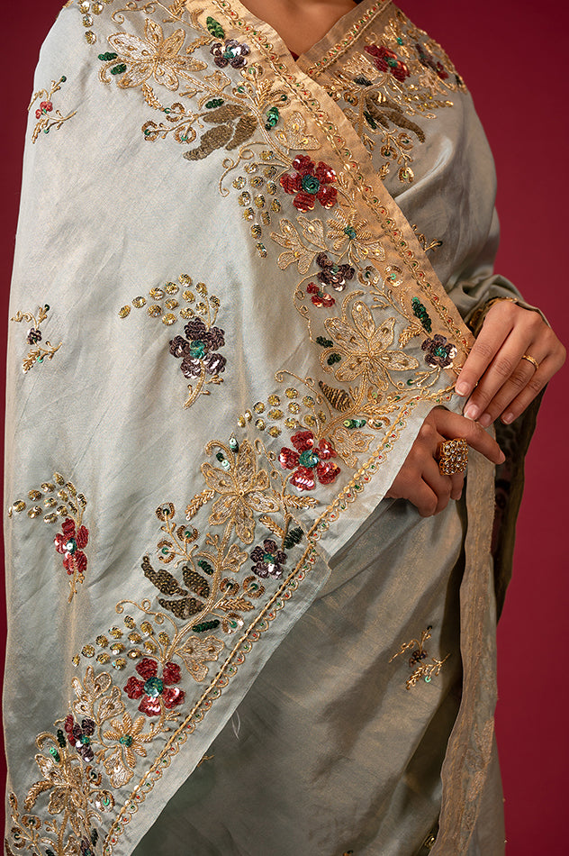 Greyish green pure tissue zardozi sequins border butti handwork saree