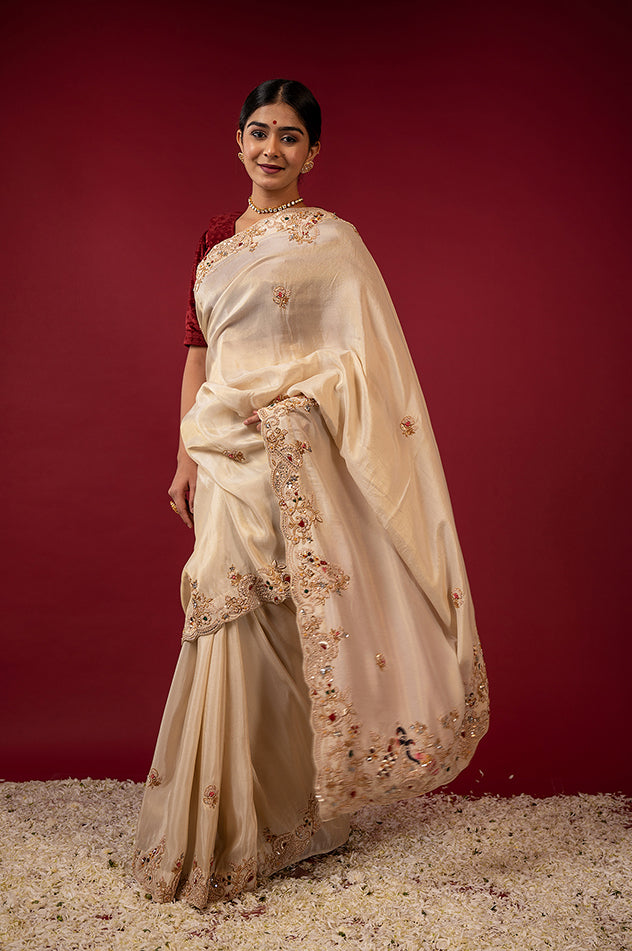 Cream pure tissue zardozi resham border butti handwork saree