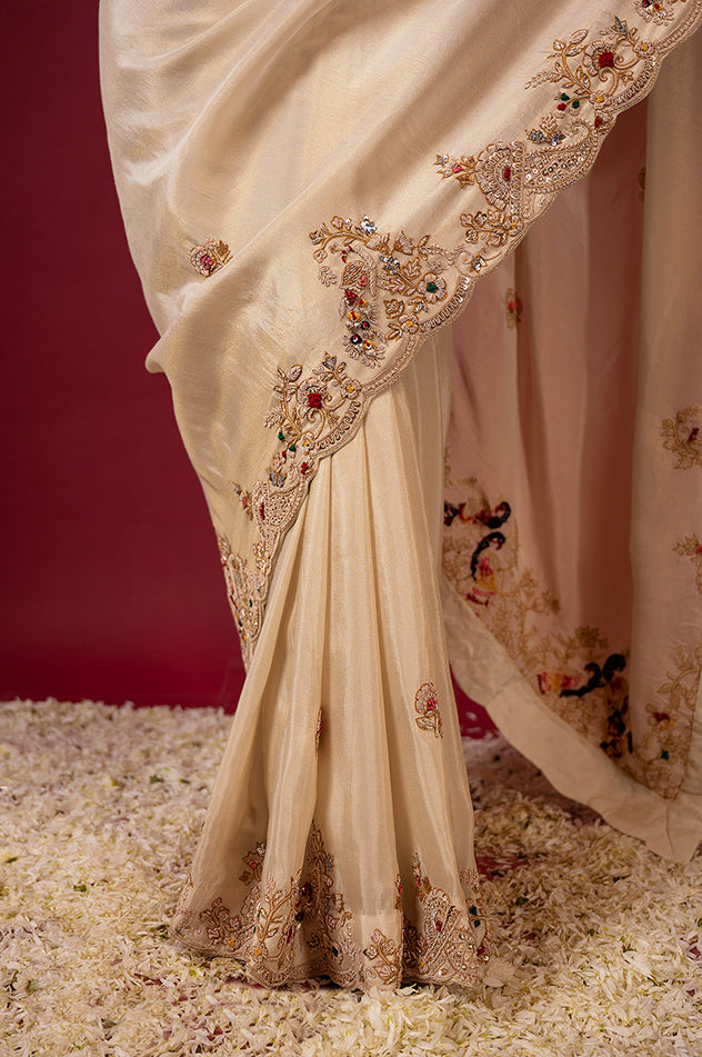 Cream pure tissue zardozi resham border butti handwork saree