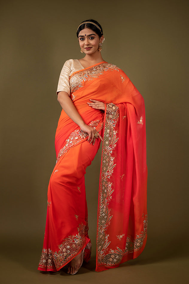 Orange light dark pure chiffon cut work border butti handwork saree