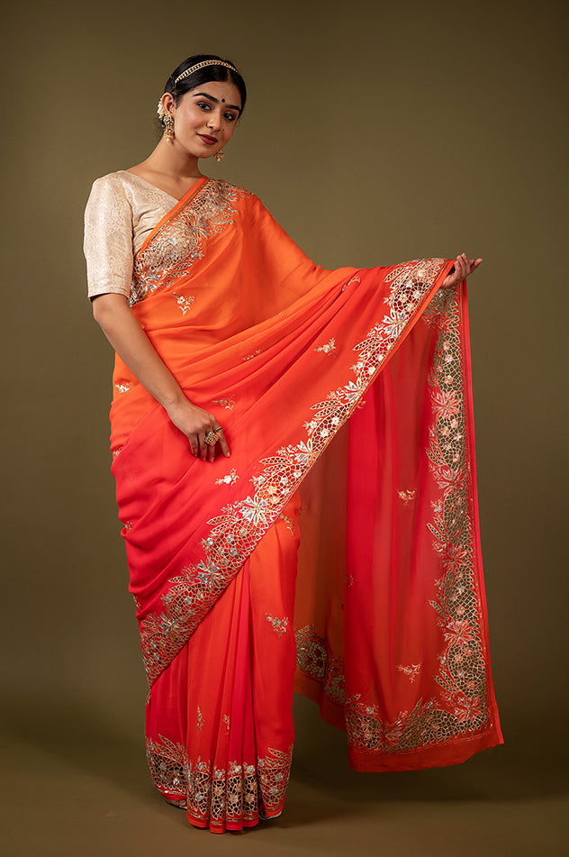 Orange light dark pure chiffon cut work border butti handwork saree