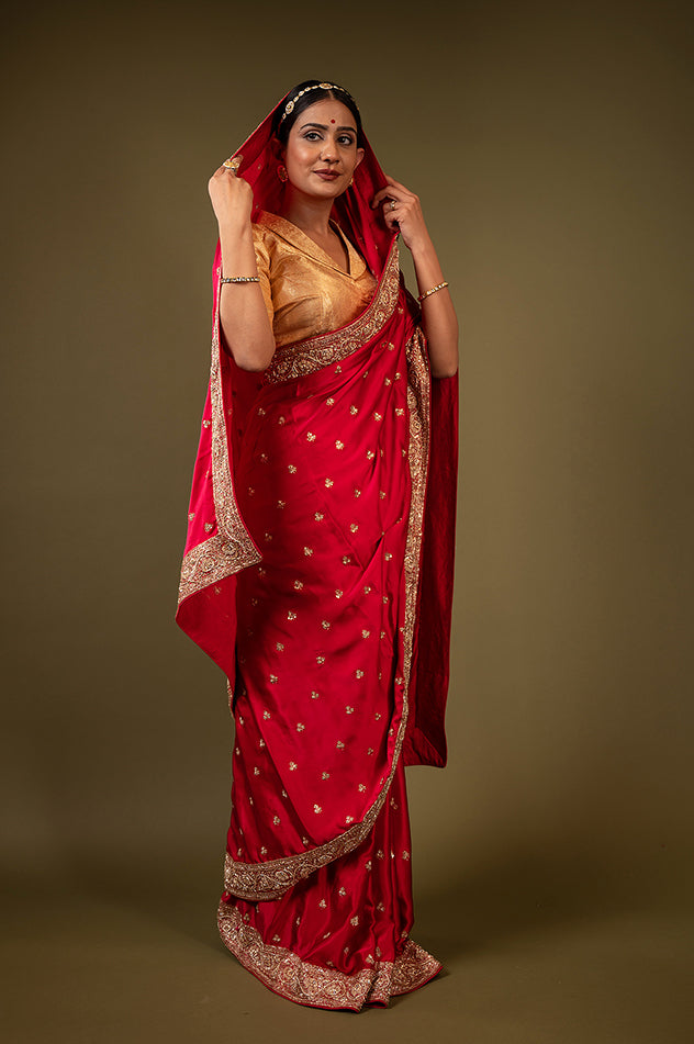 Red pure silk Satin zardozi border butti handwork saree