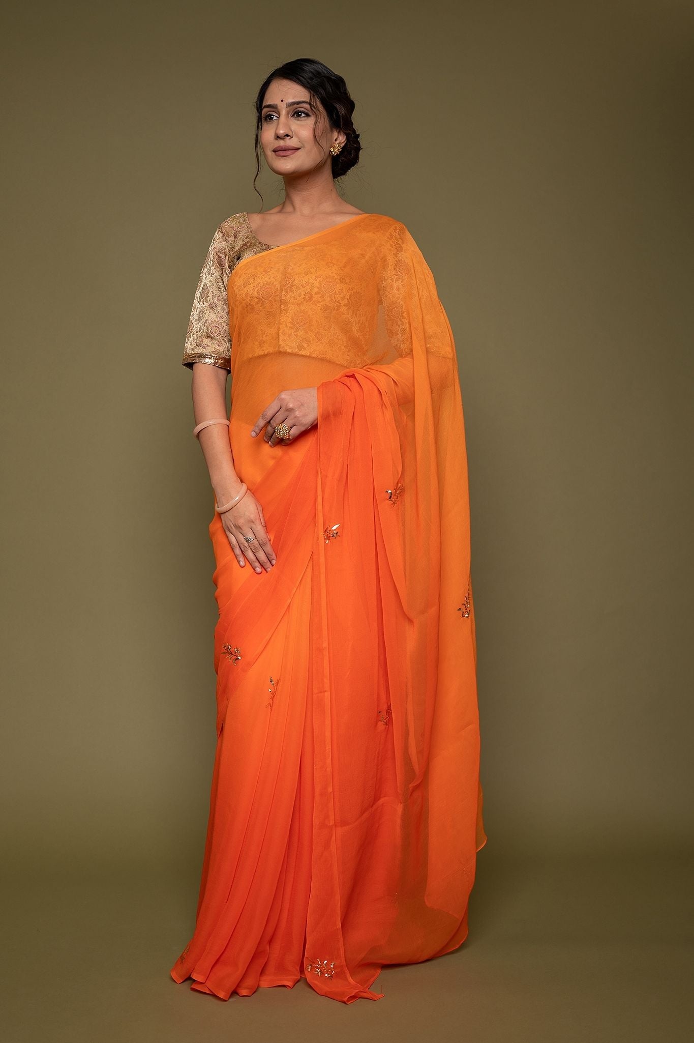 Orange viscose chiffon mughal mukesh handwork saree