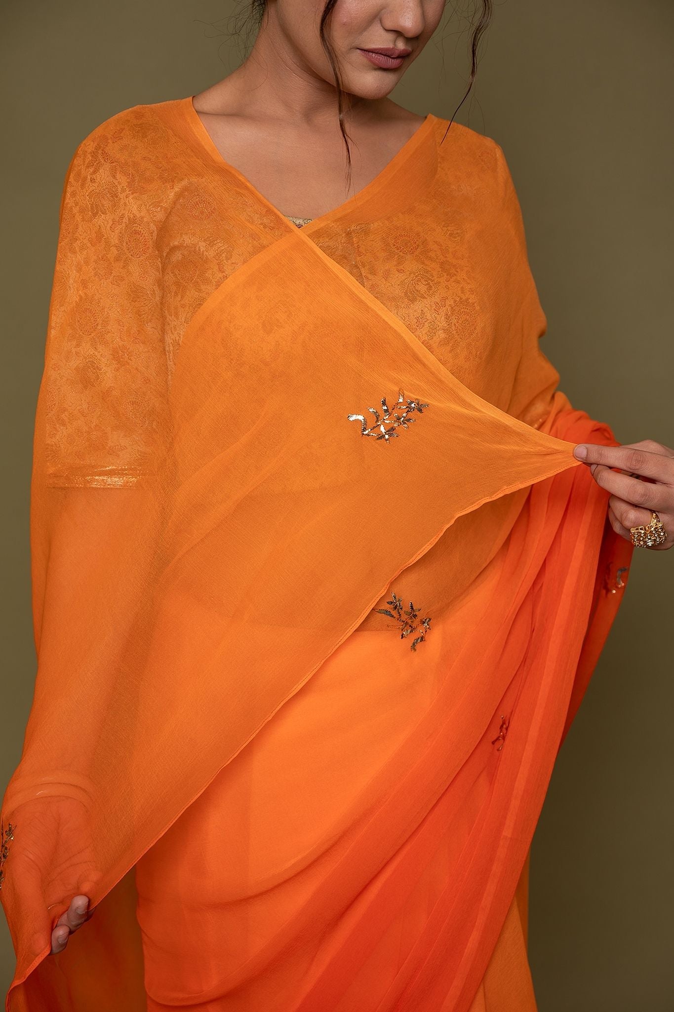 Orange viscose chiffon mughal mukesh handwork saree
