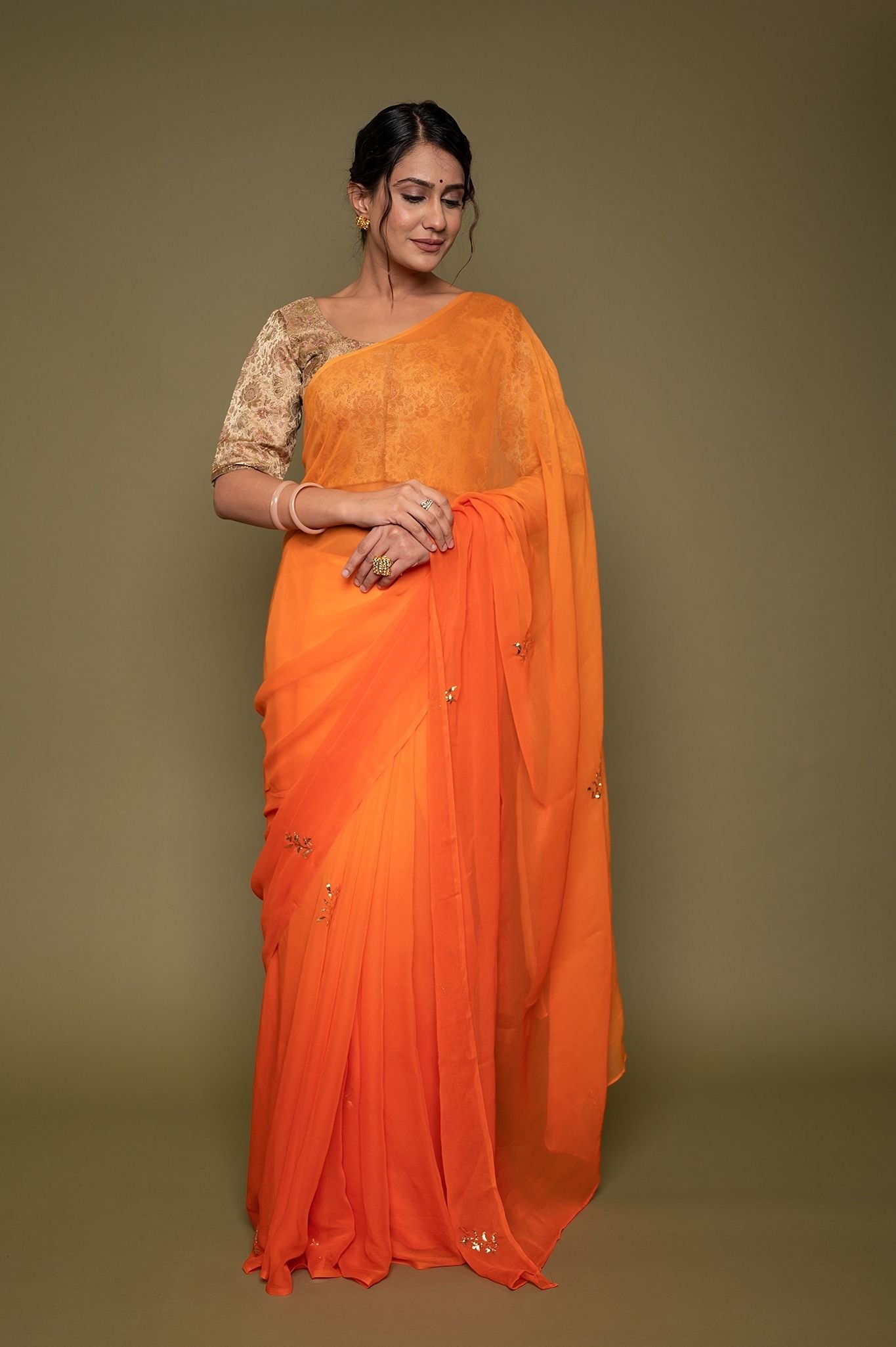 Orange viscose chiffon mughal mukesh handwork saree