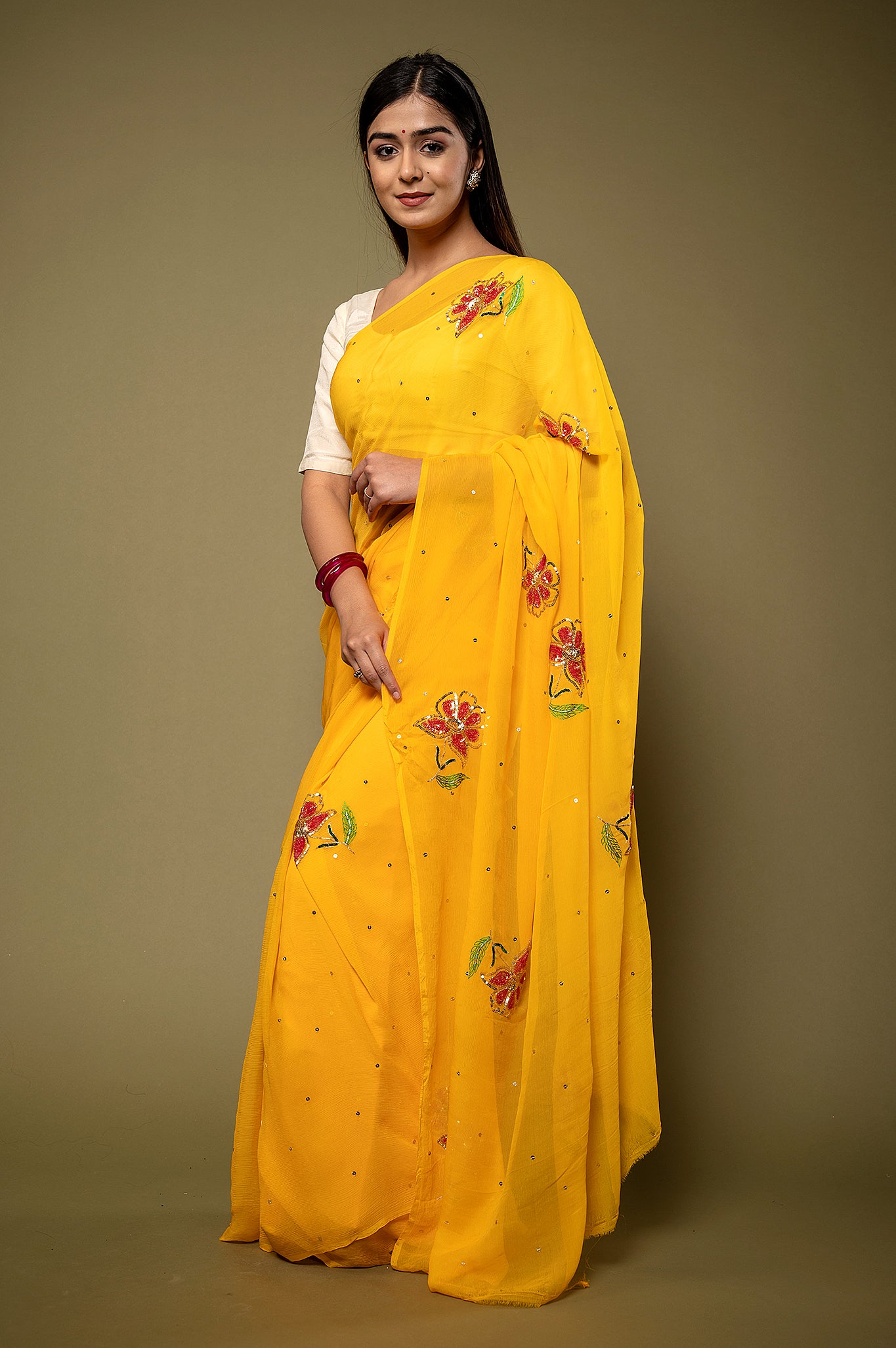 Yellow Pure chiffon sequins resham motif handwork party wear saree