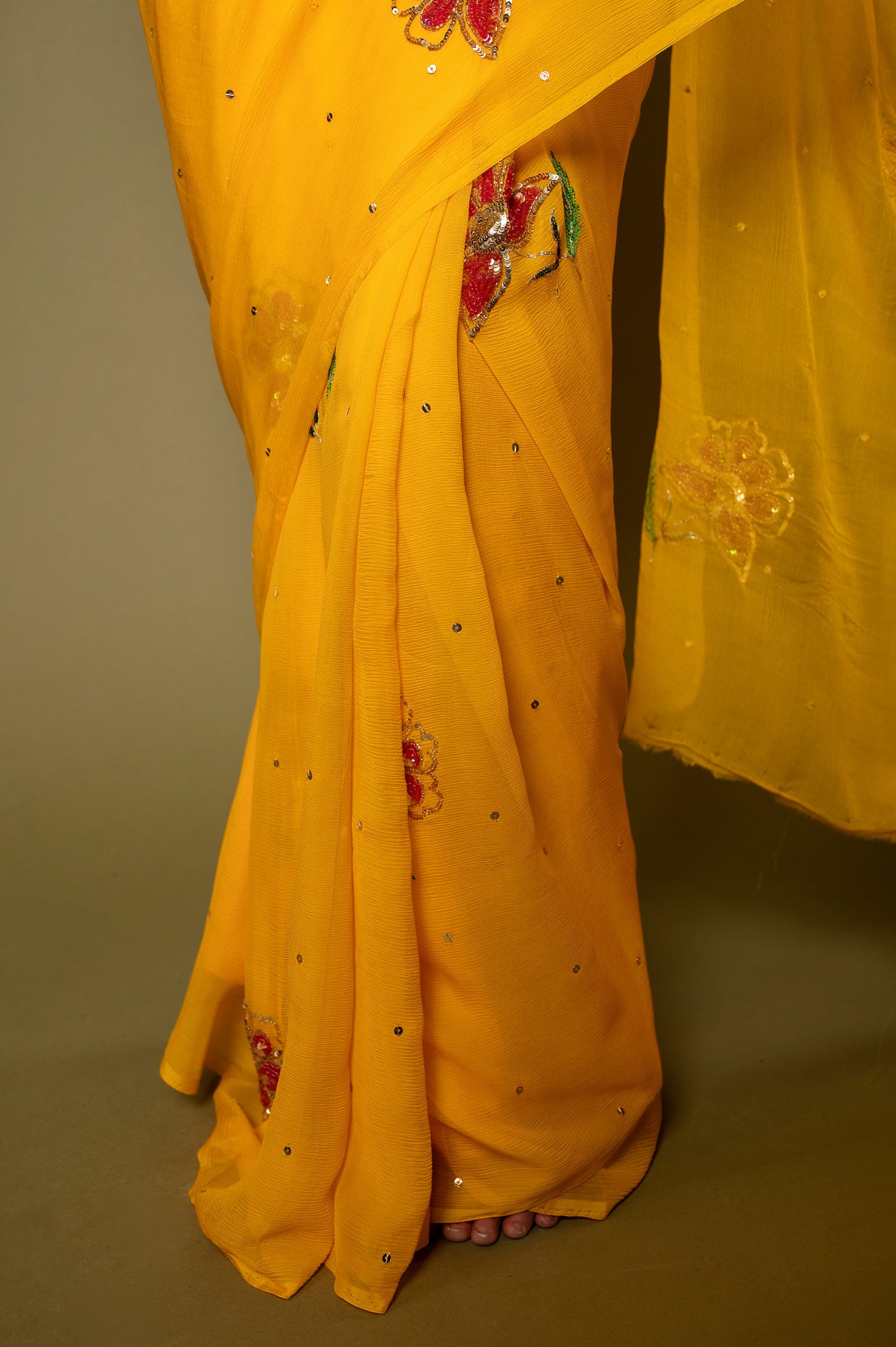 Yellow Pure chiffon sequins resham motif handwork party wear saree